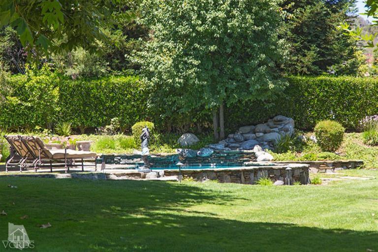 2702 Ladbrook Way Thousand Oaks, CA 91361 - Photo 35 of 45 a view of swimming pool with lawn chairs and plants