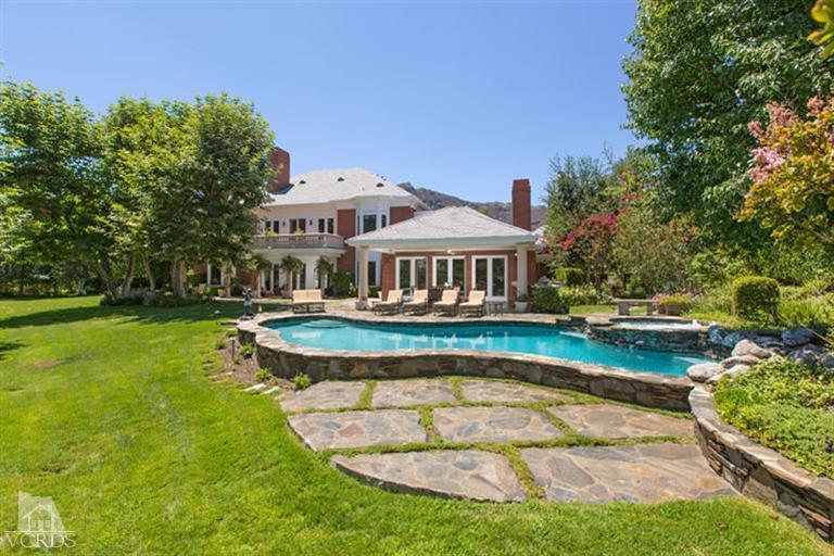 2702 Ladbrook Way Thousand Oaks, CA 91361 - Photo 40 of 45 a view of a house with swimming pool and sitting area