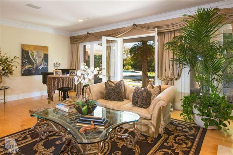 2702 Ladbrook Way Thousand Oaks, CA 91361 - Photo 8 of 45 a living room with furniture and a large window