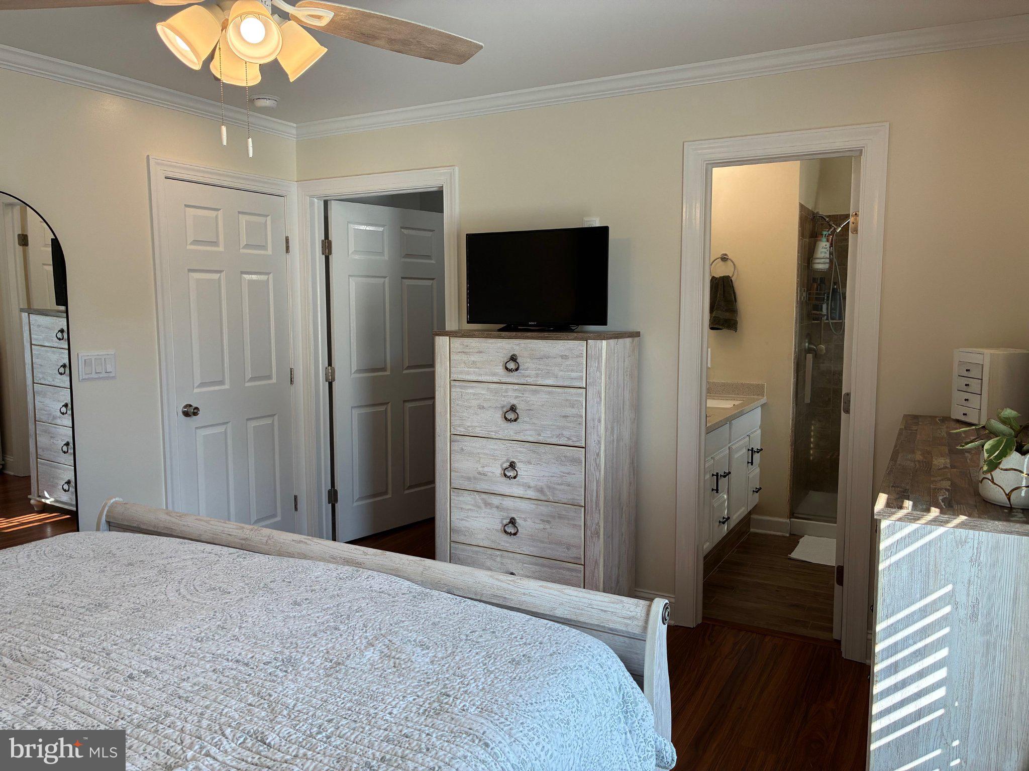 4151 Whiteleyville Road Hurlock, MD 21643 - Photo 15 of 29 Primary bedroom with walk-in closet & private bath