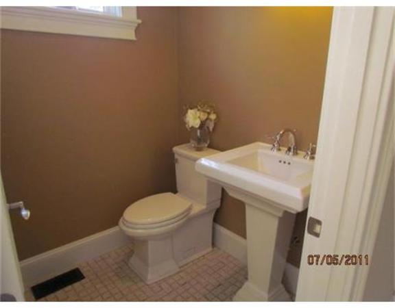 6 Rice Street, Unit 1 Wellesley, MA 02481 - Photo 8 of 8 a bathroom with a sink and a toilet