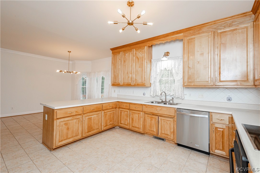 12904 Chipstead Road Chester, VA 23831 - Photo 13 of 50 a kitchen with stainless steel appliances granite countertop a sink and dishwasher a stove with granite countertops