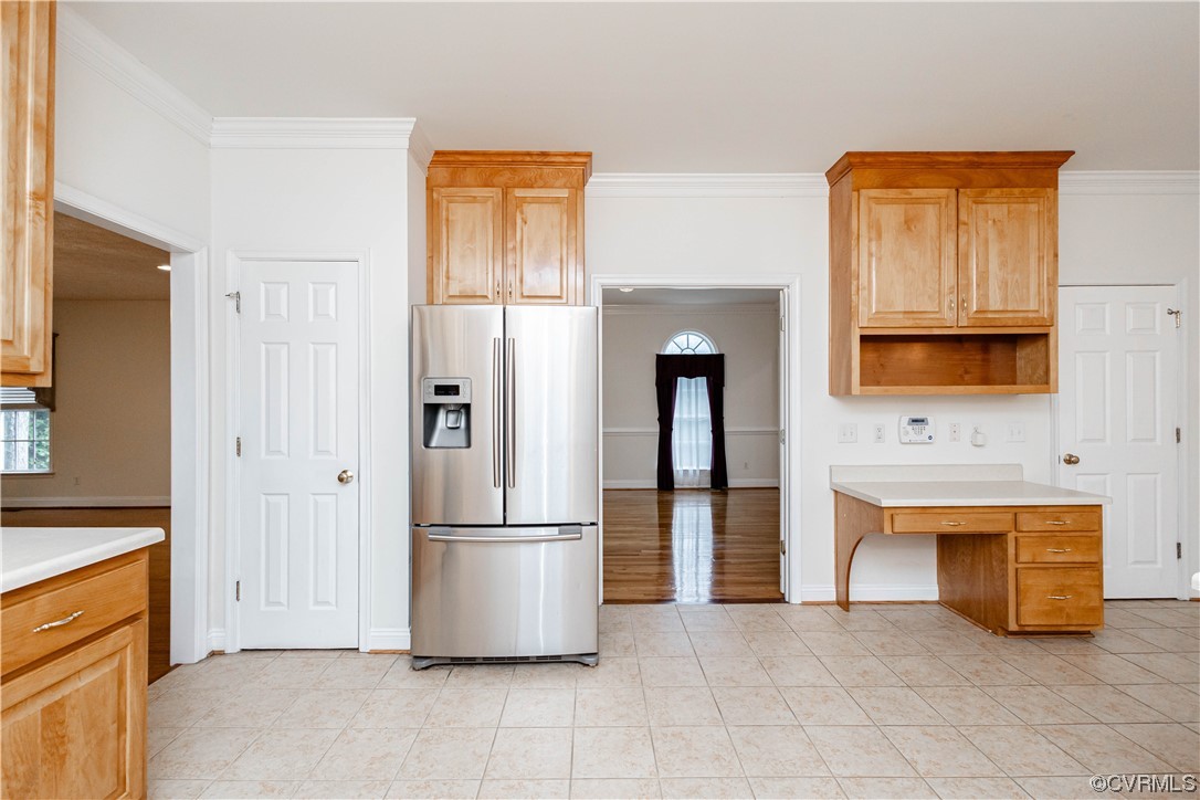 12904 Chipstead Road Chester, VA 23831 - Photo 15 of 50 a kitchen with stainless steel appliances a refrigerator and a stove top oven