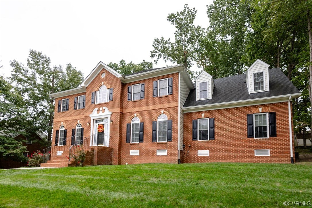 12904 Chipstead Road Chester, VA 23831 - Photo 3 of 50 a front view of house with yard and green space