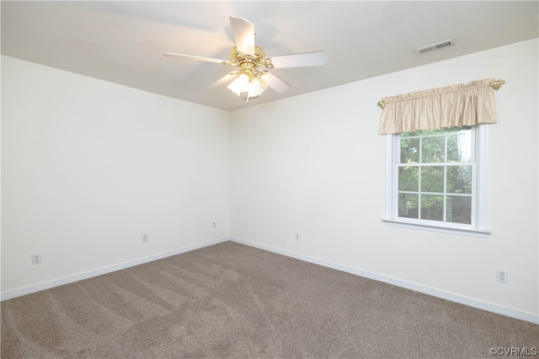 12904 Chipstead Road Chester, VA 23831 - Photo 36 of 50 an empty room with a window