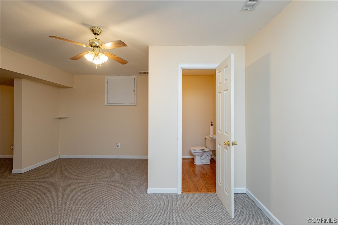 12904 Chipstead Road Chester, VA 23831 - Photo 44 of 50 a view of a livingroom with a chandelier fan