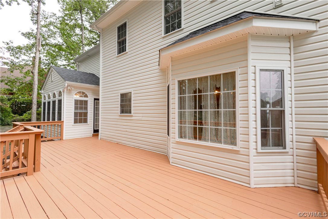 12904 Chipstead Road Chester, VA 23831 - Photo 45 of 50 a view of a house with wooden deck
