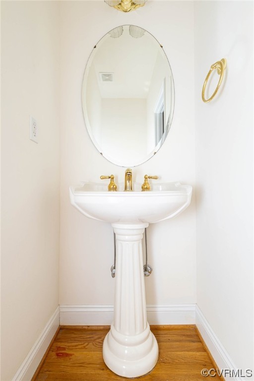 12904 Chipstead Road Chester, VA 23831 - Photo 6 of 50 a bathroom with a sink and a mirror