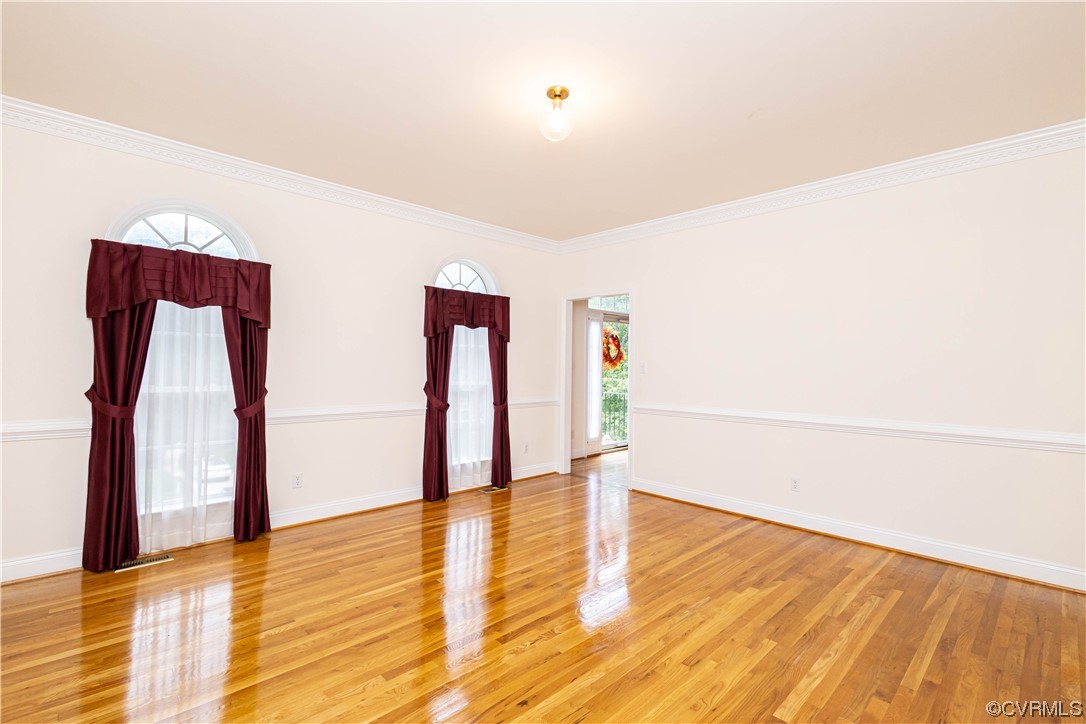 12904 Chipstead Road Chester, VA 23831 - Photo 9 of 50 a view of an empty room with wooden floor