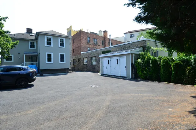 a view of a house with a large space
