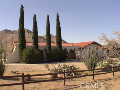 19689 Roanoke Road Apple Valley, CA 92307 - Photo 1 of 1 a view of a park with iron fence