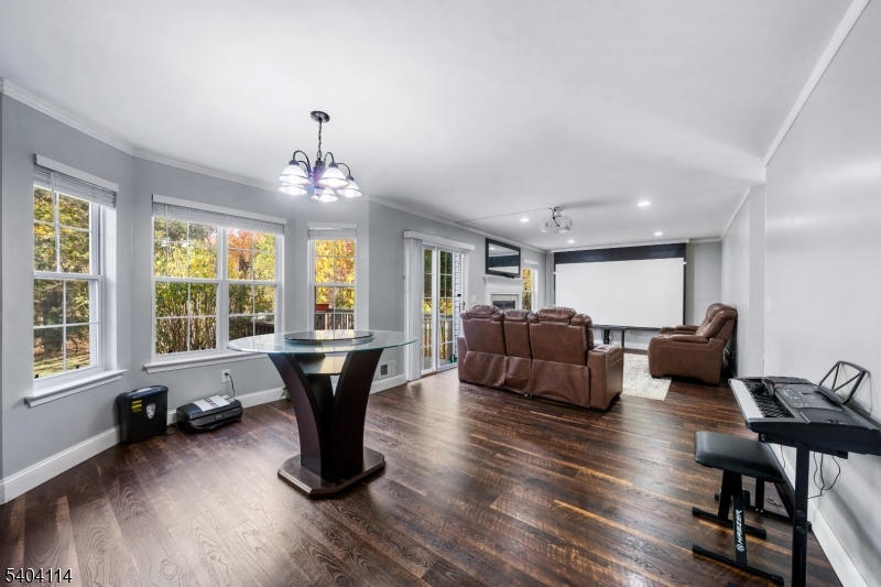 42 Springfield Road North Brunswick, NJ 08902 - Photo 13 of 29 a living room with furniture two window and wooden floor