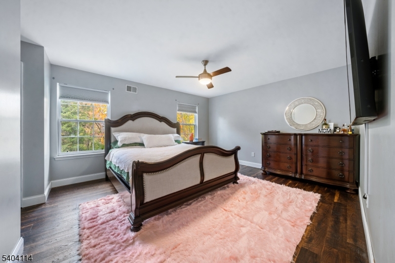 42 Springfield Road North Brunswick, NJ 08902 - Photo 20 of 29 a bedroom with a bed window and a flat tv screen on the dresser
