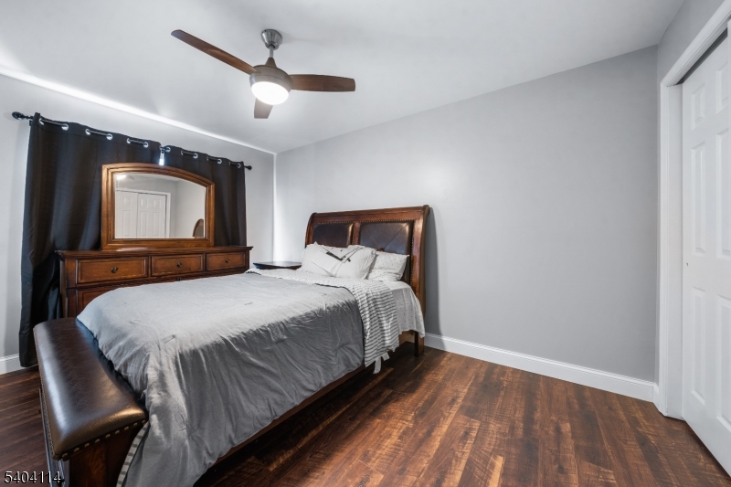 42 Springfield Road North Brunswick, NJ 08902 - Photo 21 of 29 a bedroom with a large bed and a large window