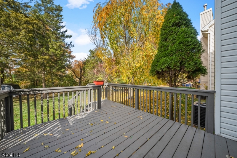 42 Springfield Road North Brunswick, NJ 08902 - Photo 5 of 29 a view of balcony with wooden floor and fence