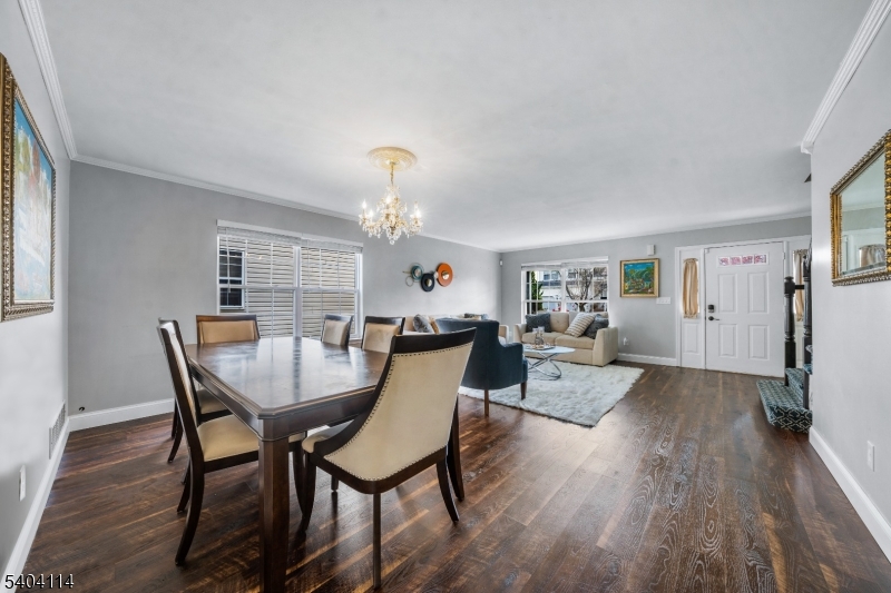 42 Springfield Road North Brunswick, NJ 08902 - Photo 10 of 29 a view of a dining room with furniture and wooden floor