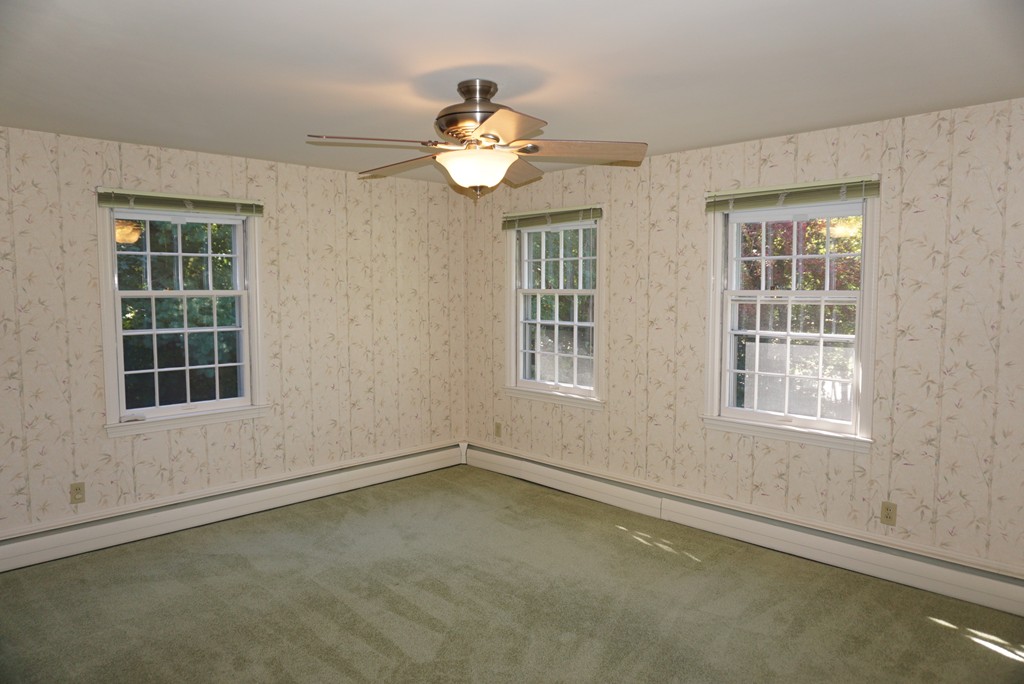 32 McGregory Road Sturbridge, MA 01566 - Photo 19 of 28 an empty room with a window