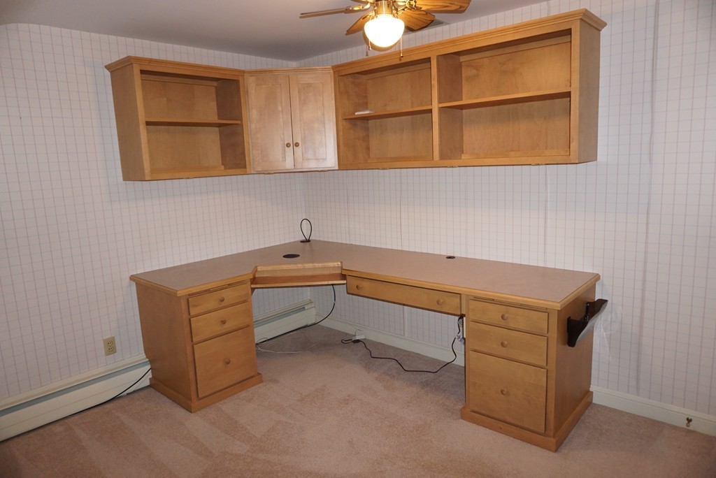 32 McGregory Road Sturbridge, MA 01566 - Photo 22 of 28 a room with storage and utility