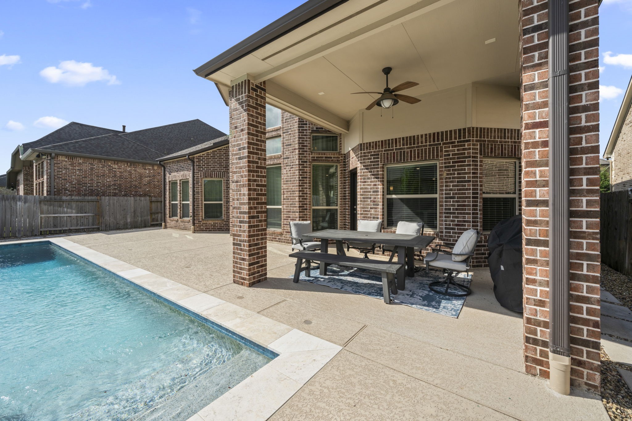 3938 Avalon Ridge Drive Spring, TX 77386 - Photo 38 of 49 The covered patio area offers plenty of space to relax and enjoy the outdoors or grill out