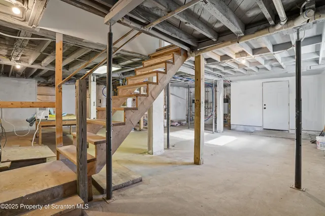 a view of a wooden balcony with a door
