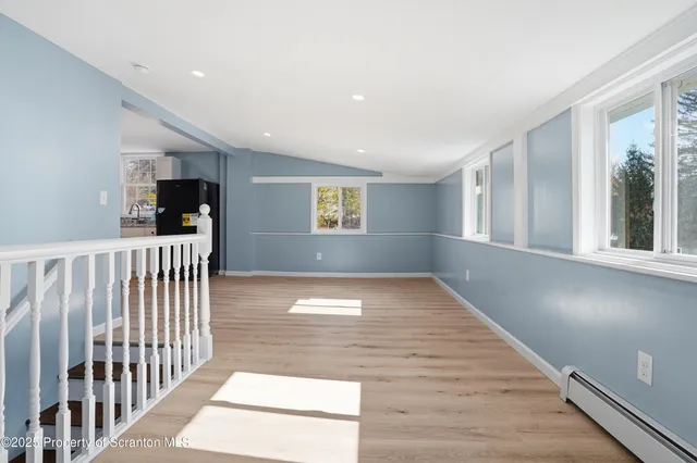 an empty room with a workspace