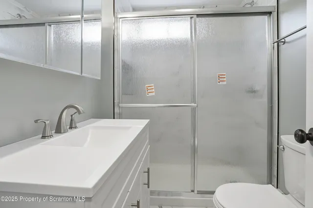 a view of house with backyard space and garden