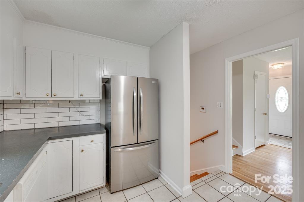 810 Applegate Court Gastonia, NC 28054 - Photo 11 of 31 a white refrigerator freezer sitting inside of a kitchen