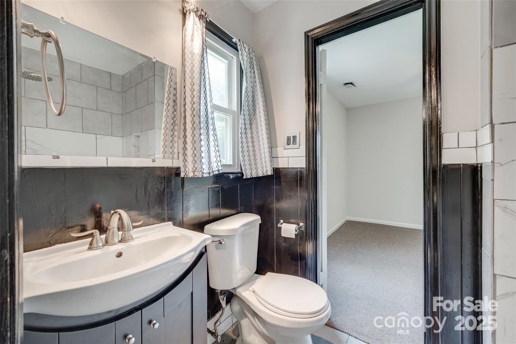 810 Applegate Court Gastonia, NC 28054 - Photo 24 of 31 a bathroom with a sink a toilet and mirror