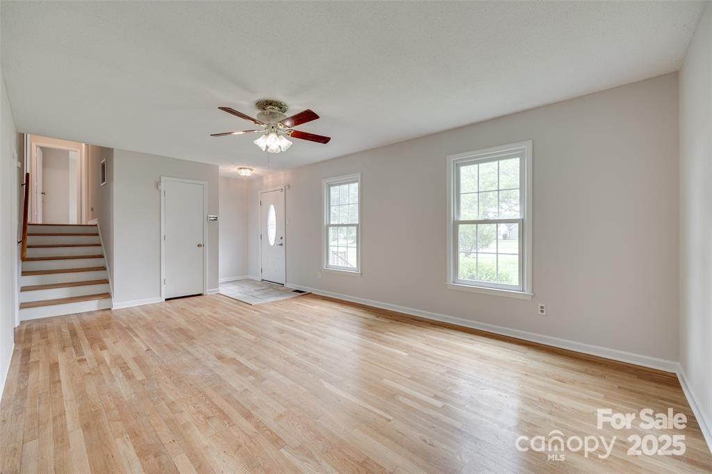 810 Applegate Court Gastonia, NC 28054 - Photo 4 of 31 wooden floor in an empty room with a window