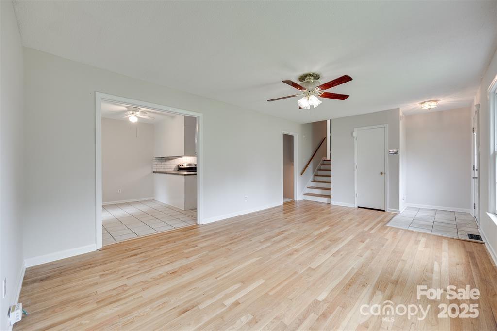 810 Applegate Court Gastonia, NC 28054 - Photo 5 of 31 a view of an empty room with a ceiling fan