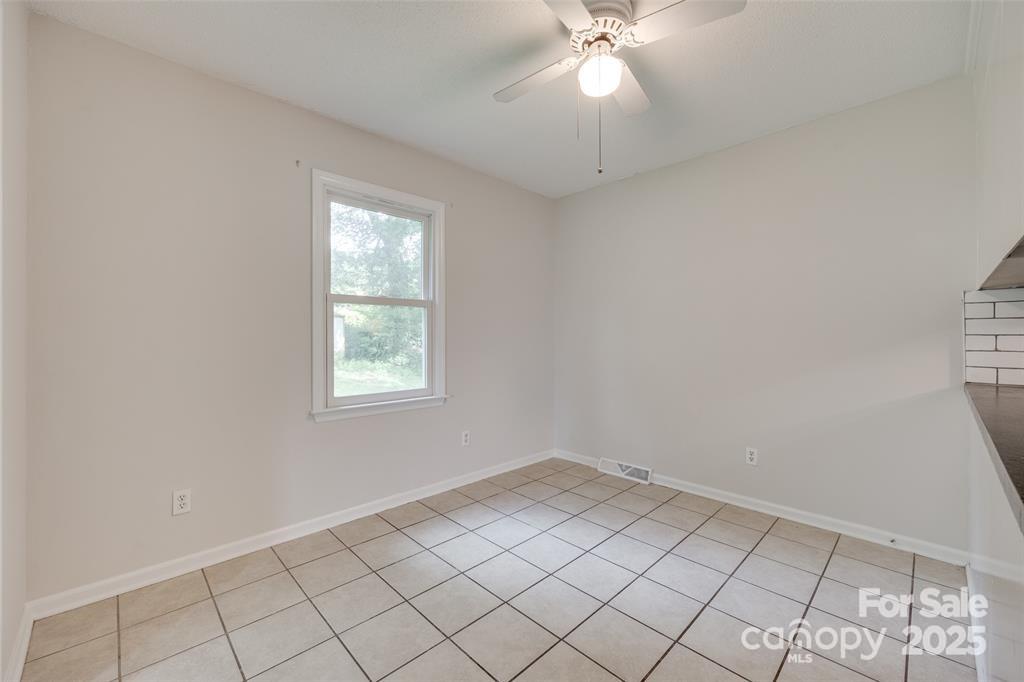 810 Applegate Court Gastonia, NC 28054 - Photo 6 of 31 a view of an empty room with a window