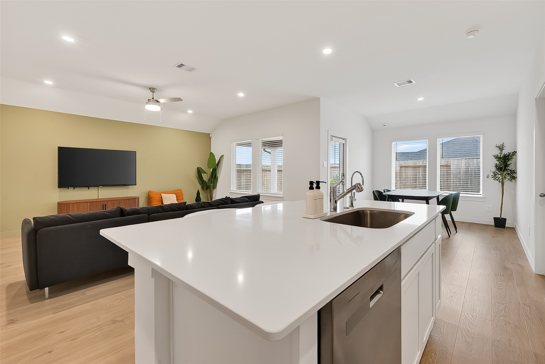 3903 Dodington Ash Drive Fulshear, TX 77441 - Photo 17 of 46 a large kitchen with sink a counter top space and stainless steel appliances