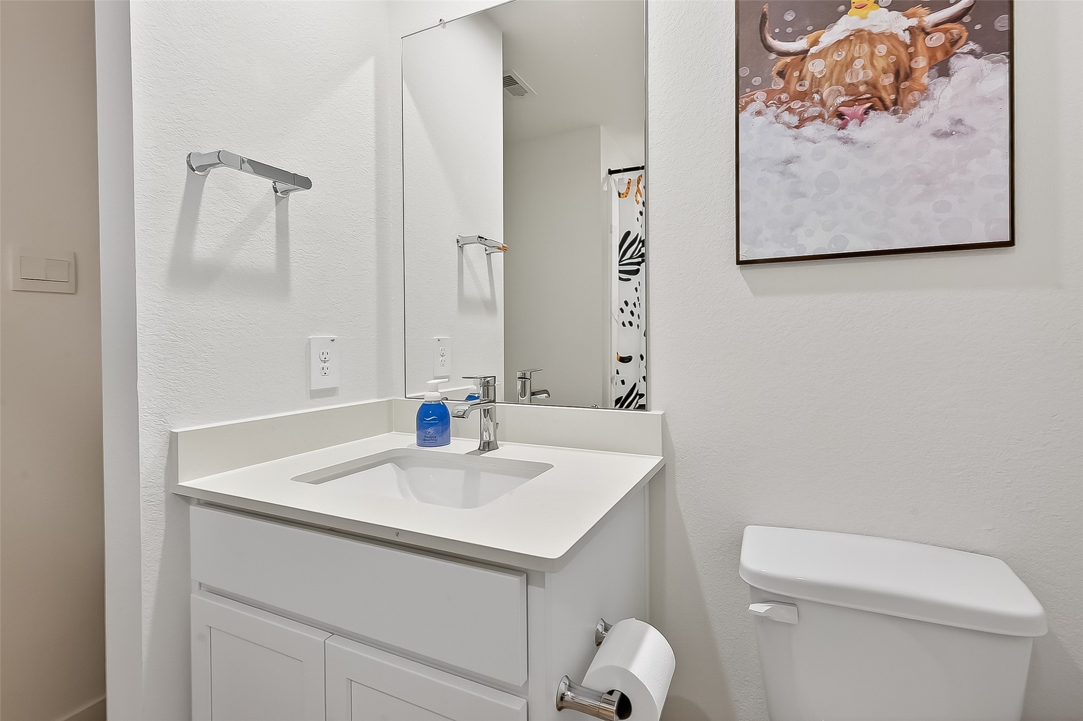 3903 Dodington Ash Drive Fulshear, TX 77441 - Photo 31 of 46 a bathroom with a sink a toilet and mirror