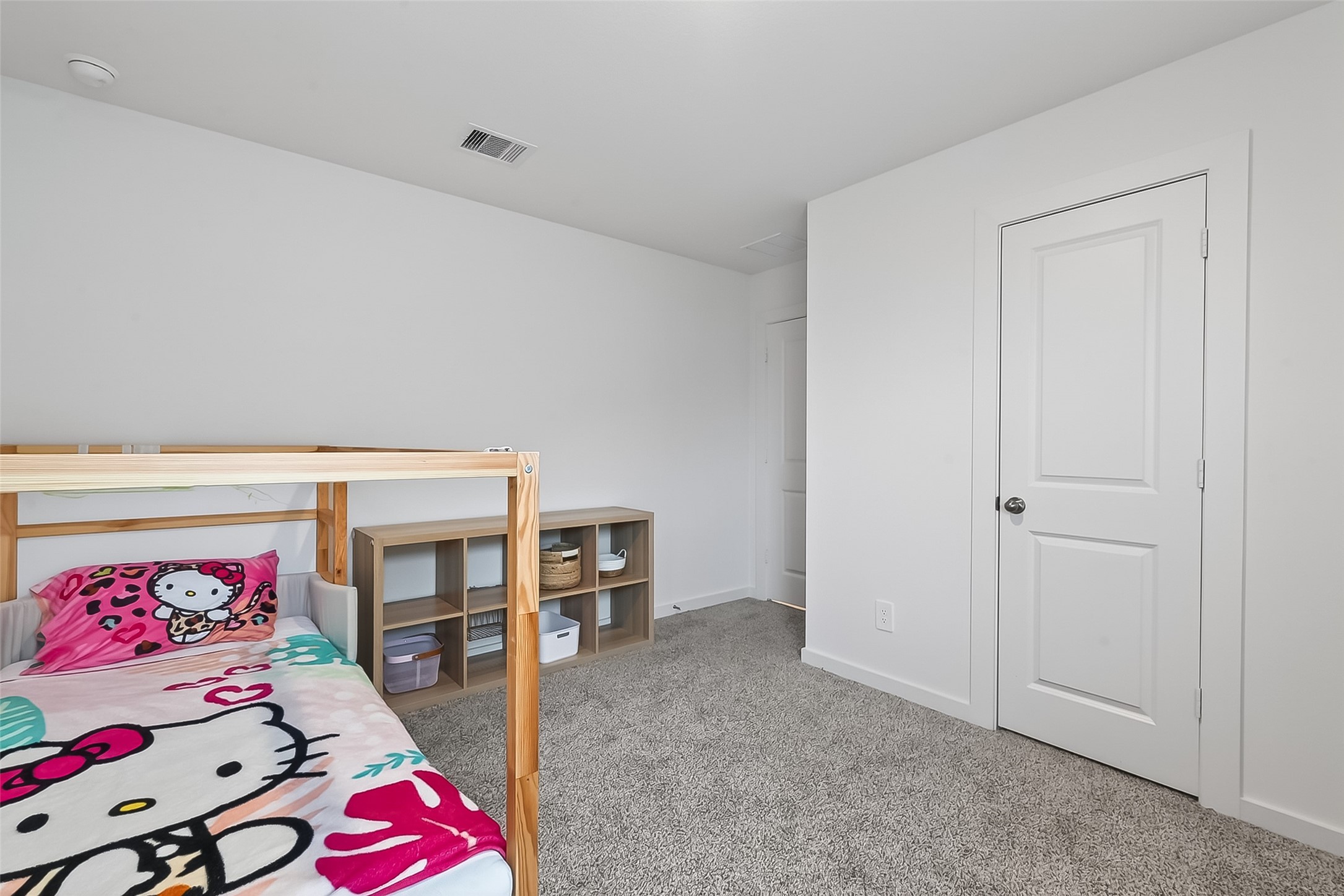 3903 Dodington Ash Drive Fulshear, TX 77441 - Photo 33 of 46 a living room with furniture a baby crib and a couch