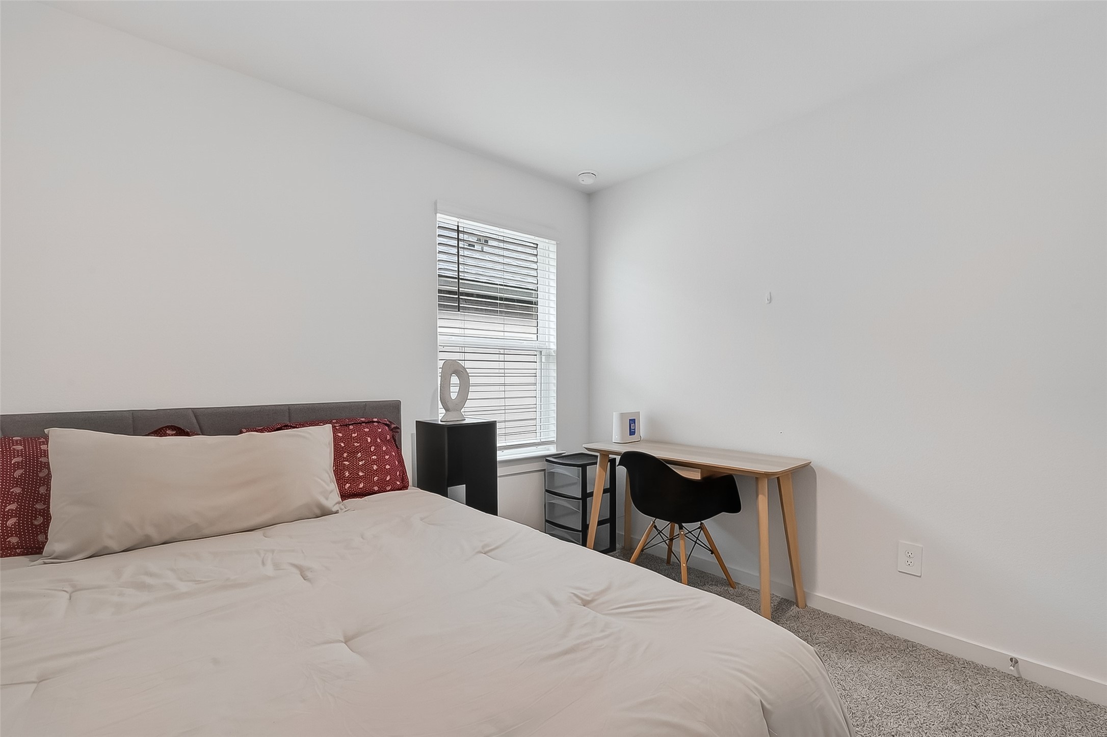 3903 Dodington Ash Drive Fulshear, TX 77441 - Photo 35 of 46 a bedroom with a bed and a window