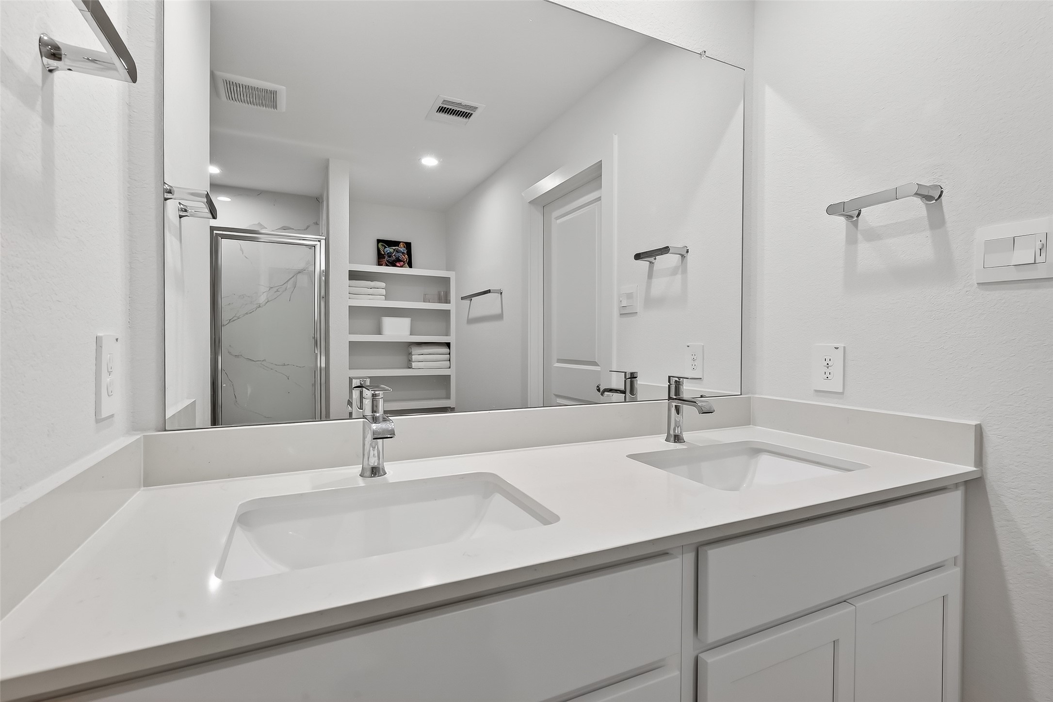 3903 Dodington Ash Drive Fulshear, TX 77441 - Photo 40 of 46 a bathroom with a sink and a mirror