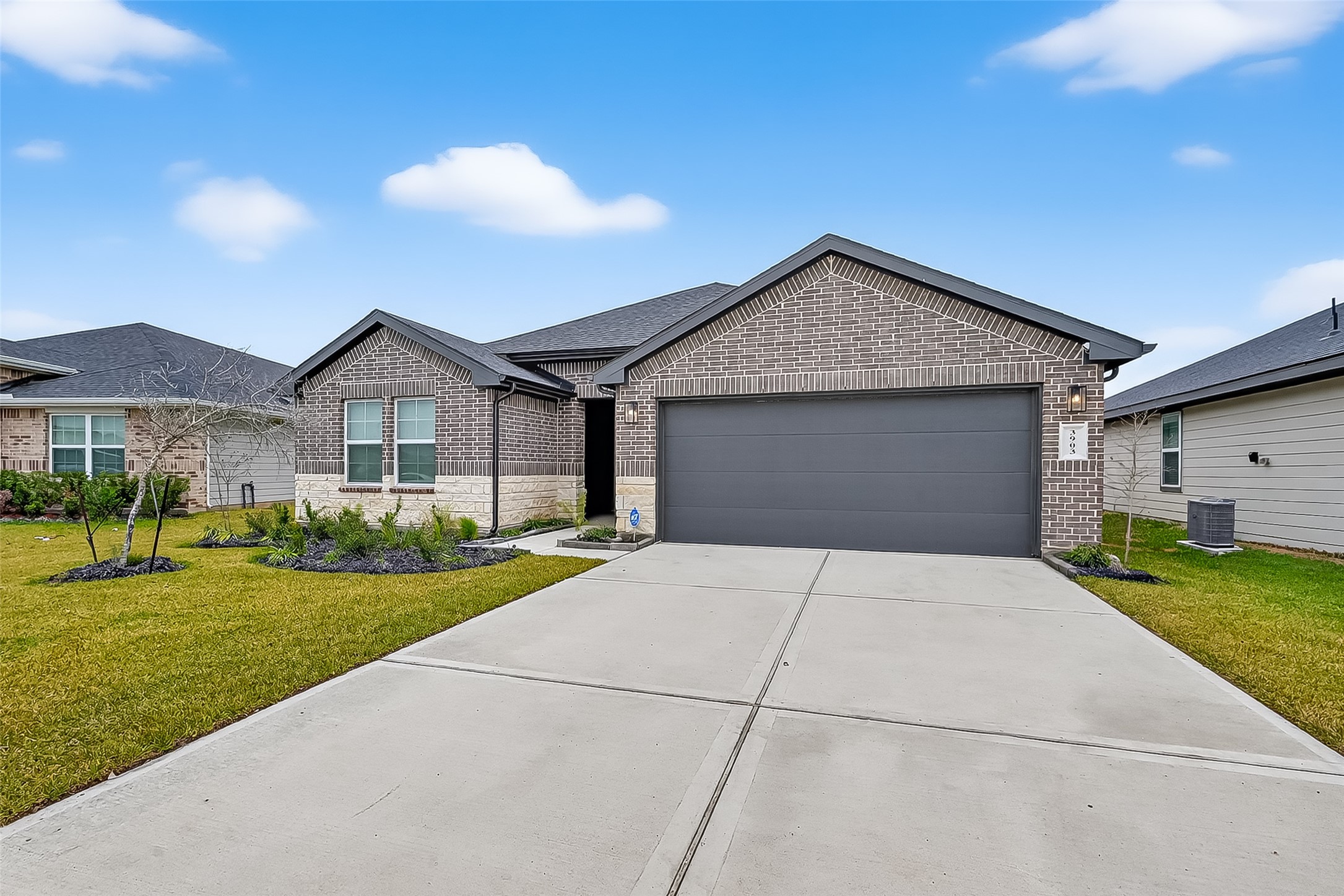 3903 Dodington Ash Drive Fulshear, TX 77441 - Photo 4 of 46 a front view of a house with garden