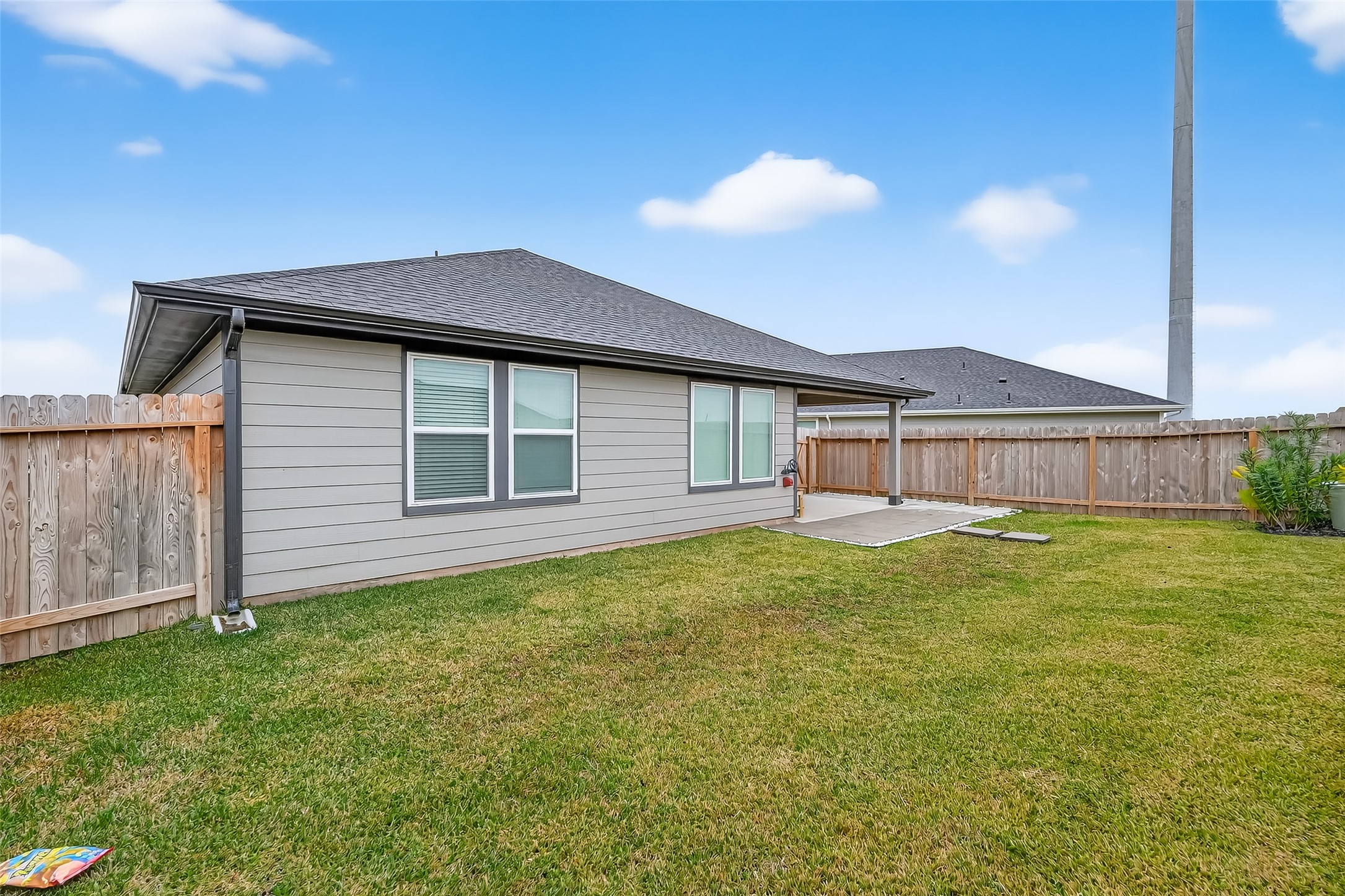3903 Dodington Ash Drive Fulshear, TX 77441 - Photo 43 of 46 a view of a house with a backyard