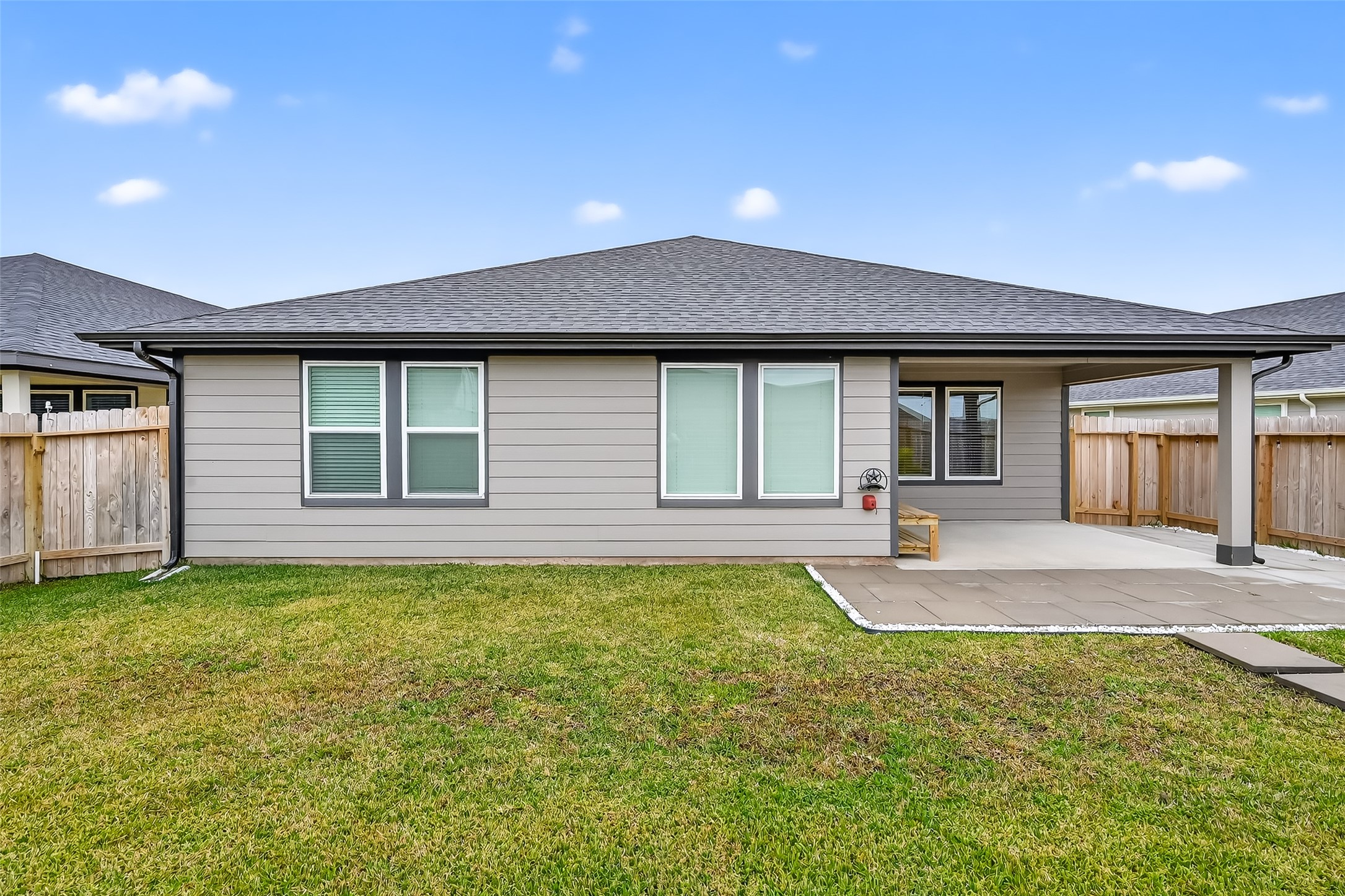 3903 Dodington Ash Drive Fulshear, TX 77441 - Photo 44 of 46 a front view of a house with swimming pool and porch