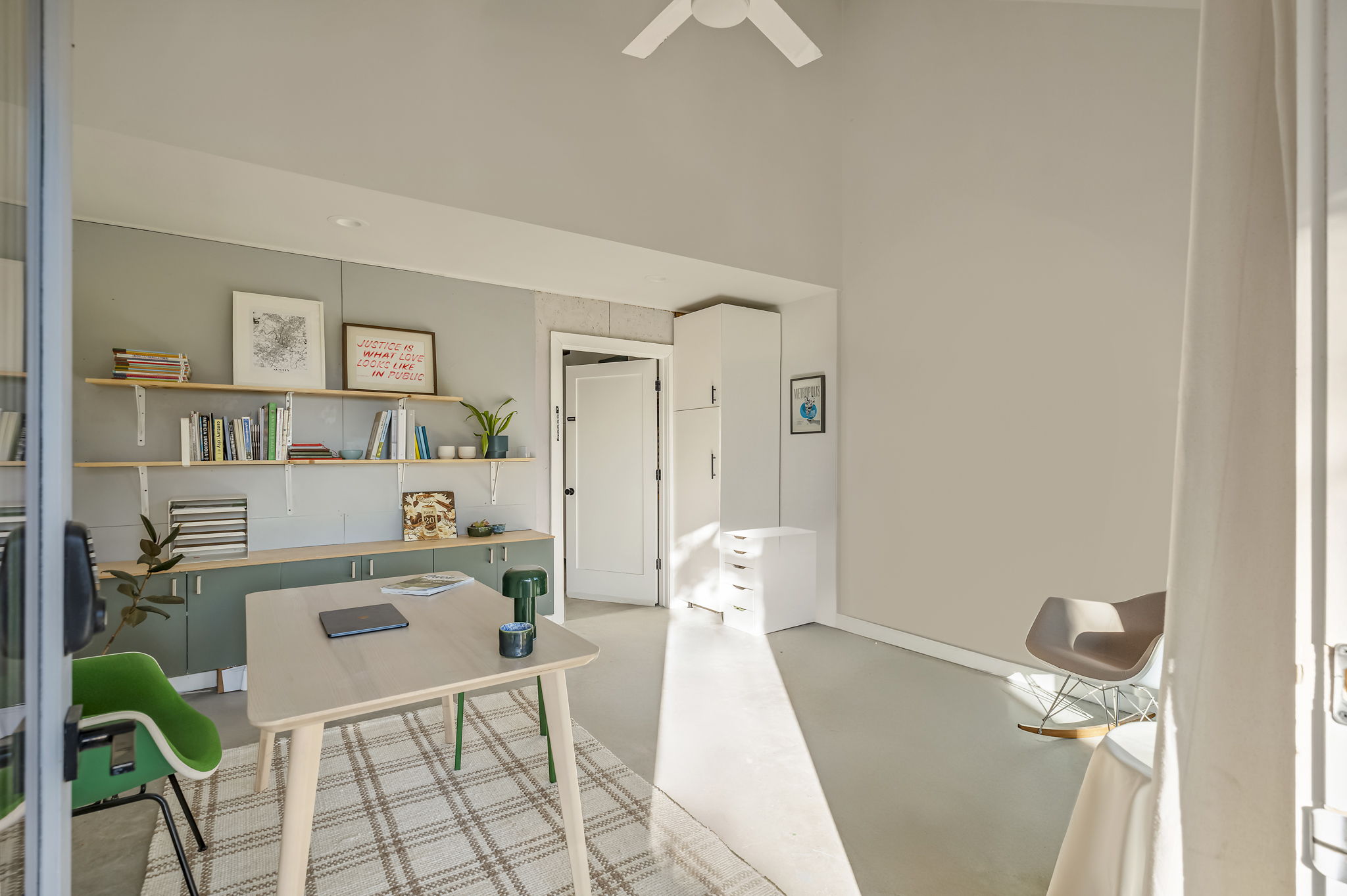 618 Denson Drive Austin, TX 78752 - Photo 24 of 35 a living room with furniture and a wooden floor