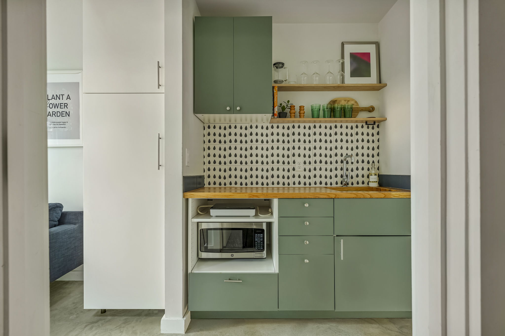 618 Denson Drive Austin, TX 78752 - Photo 27 of 35 a bathroom with a sink and a mirror