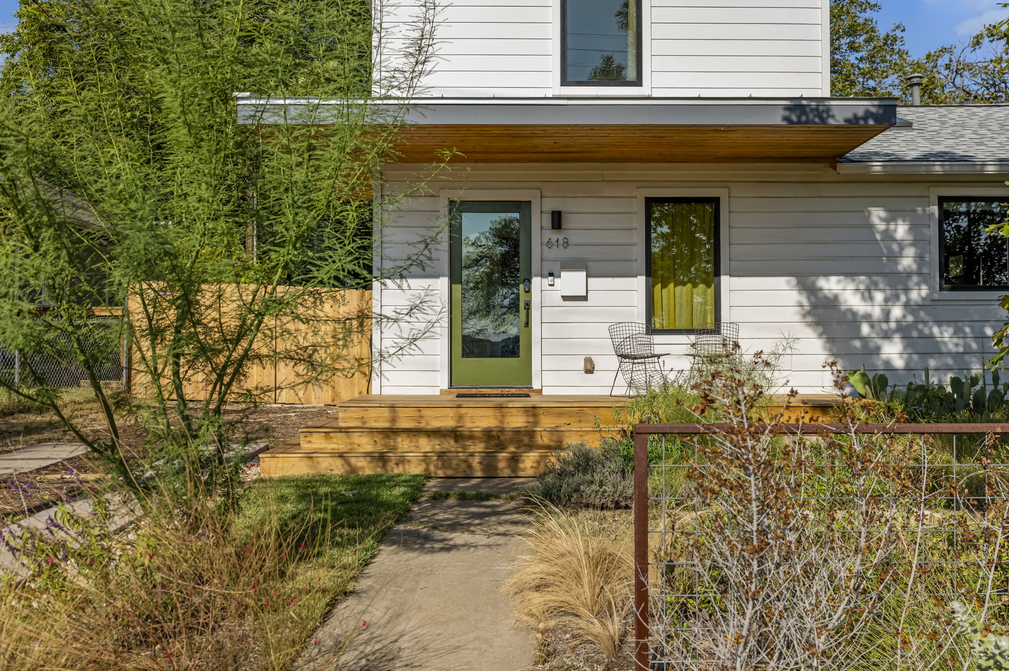 618 Denson Drive Austin, TX 78752 - Photo 3 of 35 front view of a house with a small yard