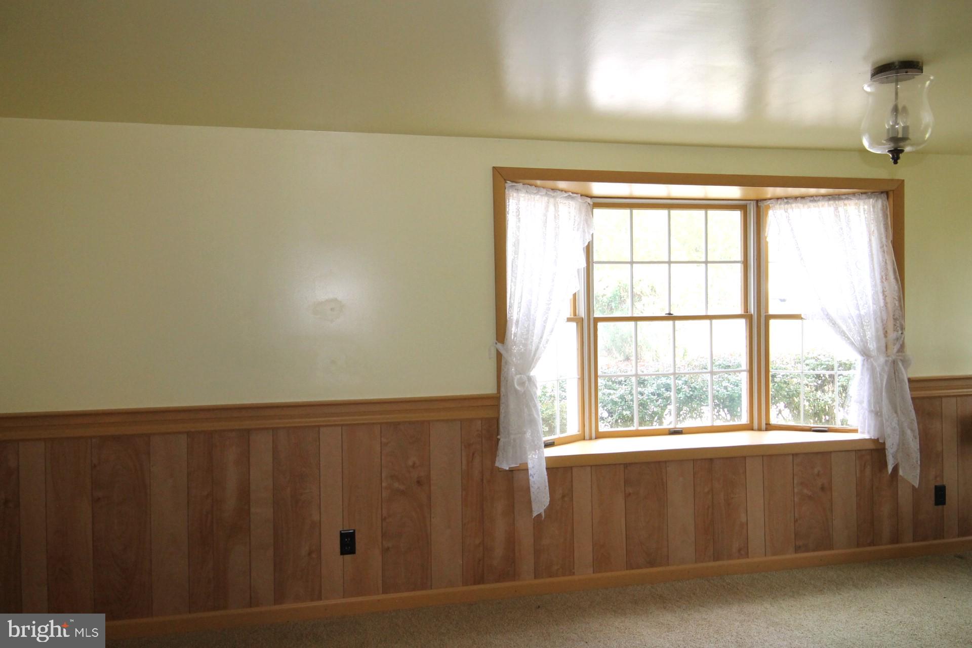 5010 Wards Chapel Road Reisterstown, MD 21136 - Photo 7 of 34 Natural light fills this room with warmth