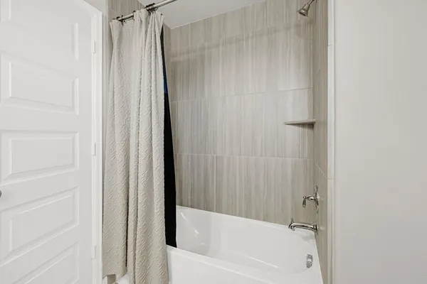 a bathroom with a bathtub
