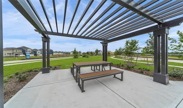 a front view of a building with outdoor space