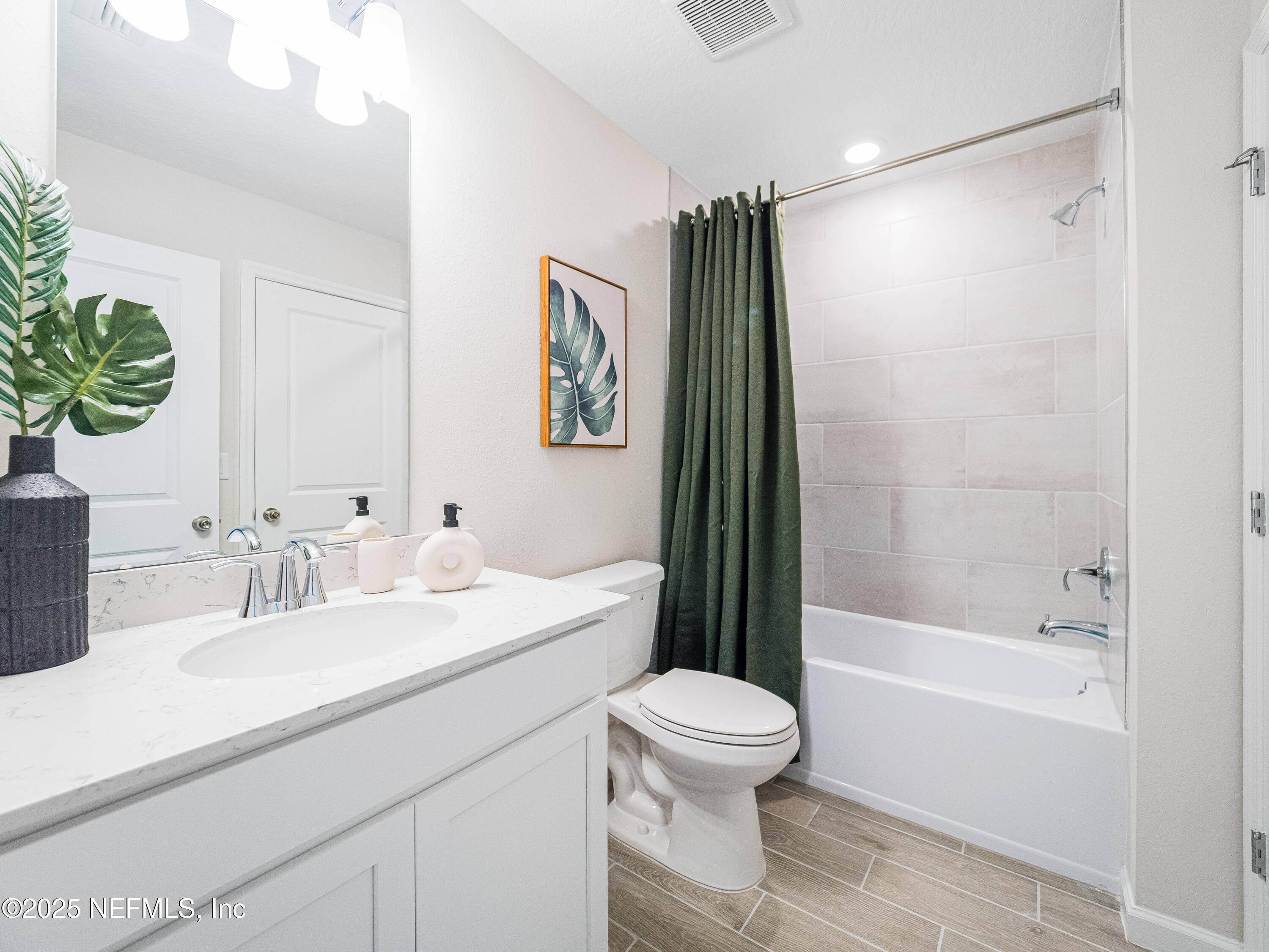 101 Hubbard Bend St. Augustine, FL 32092 - Photo 32 of 42 a bathroom with a sink toilet and shower