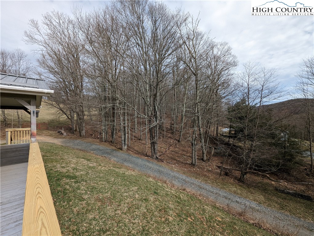 330 Sugarworth Mountain Road Boone, NC 28607 - Photo 13 of 43 a view of a yard with trees