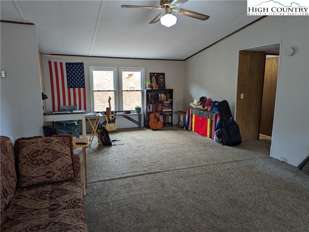 330 Sugarworth Mountain Road Boone, NC 28607 - Photo 18 of 43 a living room with furniture and a window