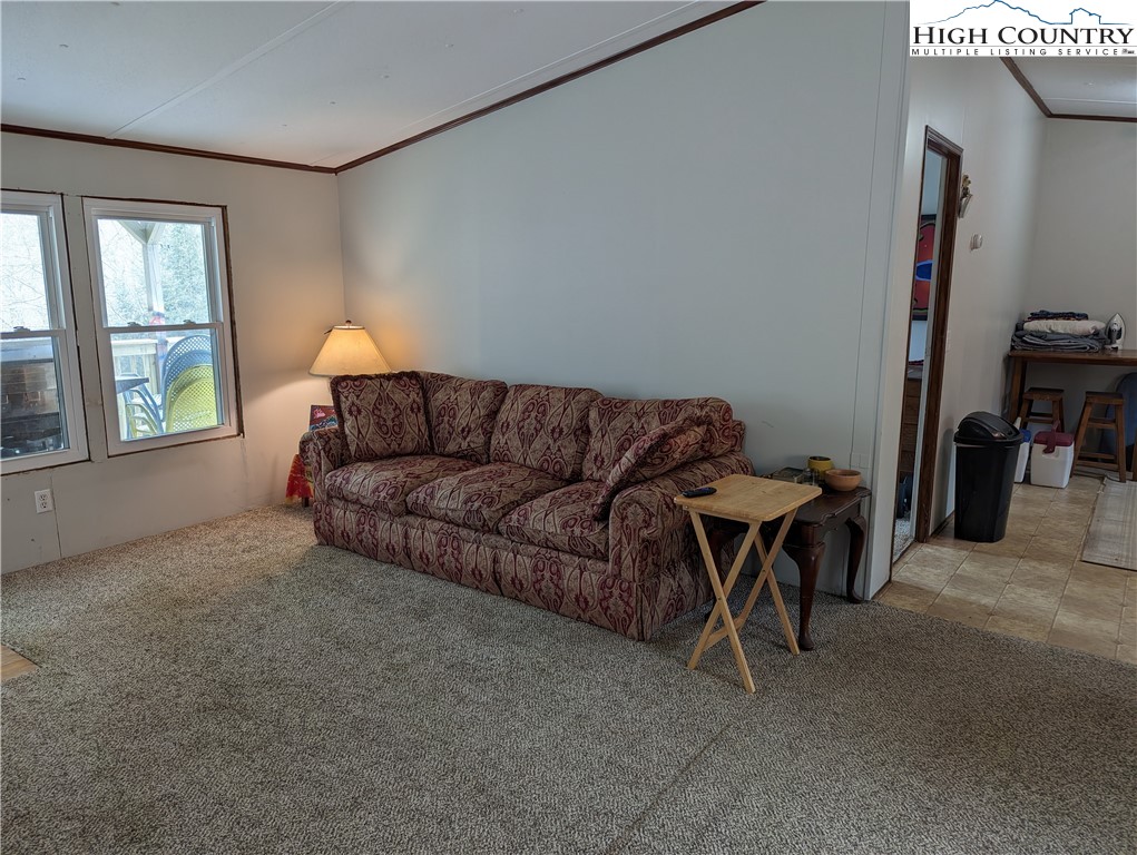 330 Sugarworth Mountain Road Boone, NC 28607 - Photo 19 of 43 a living room with furniture and a window