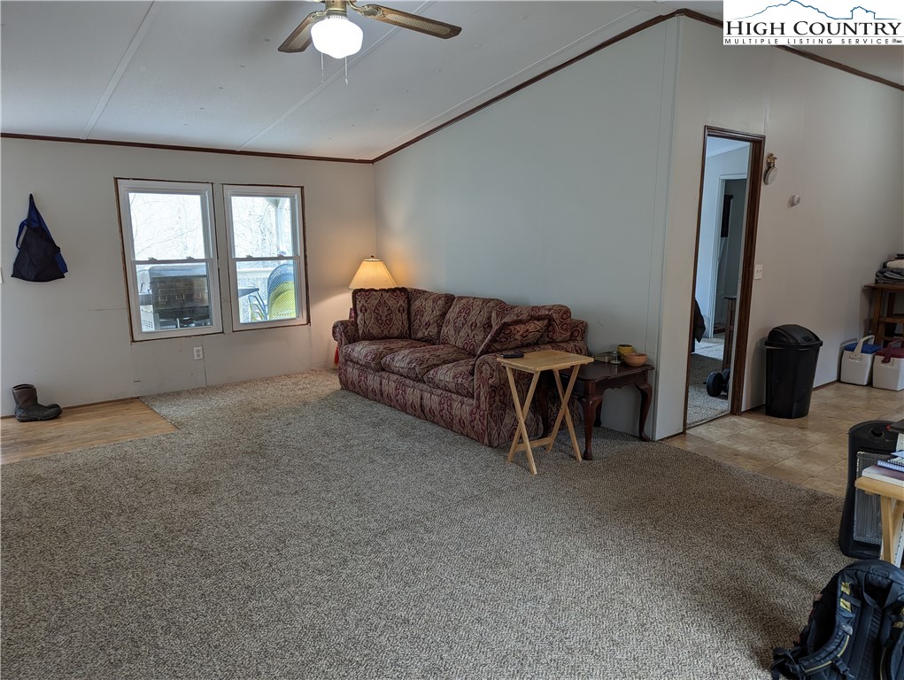 330 Sugarworth Mountain Road Boone, NC 28607 - Photo 20 of 43 a living room with furniture and a window